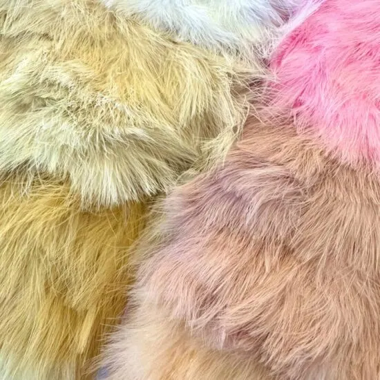 Fluffy marabou feather trim sold by the yard at Shinetrim, New Jersey's premier trim store, perfect for costumes, evening wear, and millinery projects.