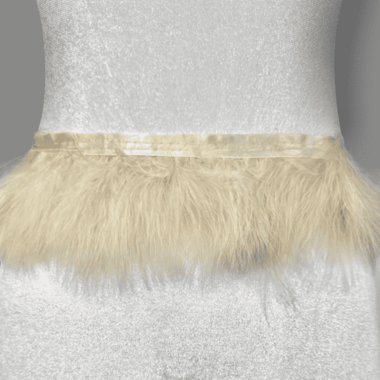 Fluffy marabou feather trim sold by the yard at Shinetrim, New Jersey's premier trim store, perfect for costumes, evening wear, and millinery projects.